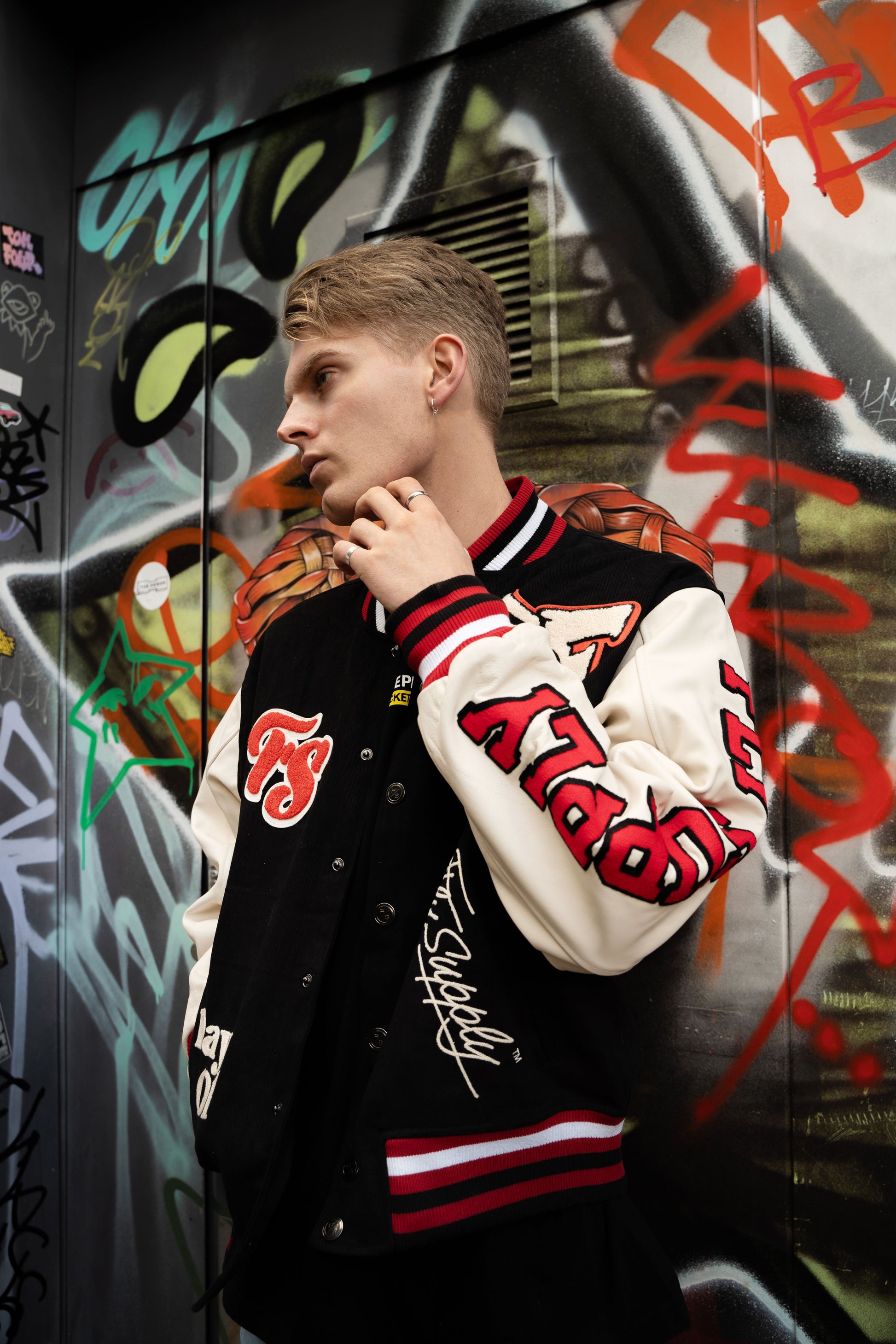 Manifest Varsity Jacket (Black) - RUN THE STREETS COLLABORATIVE