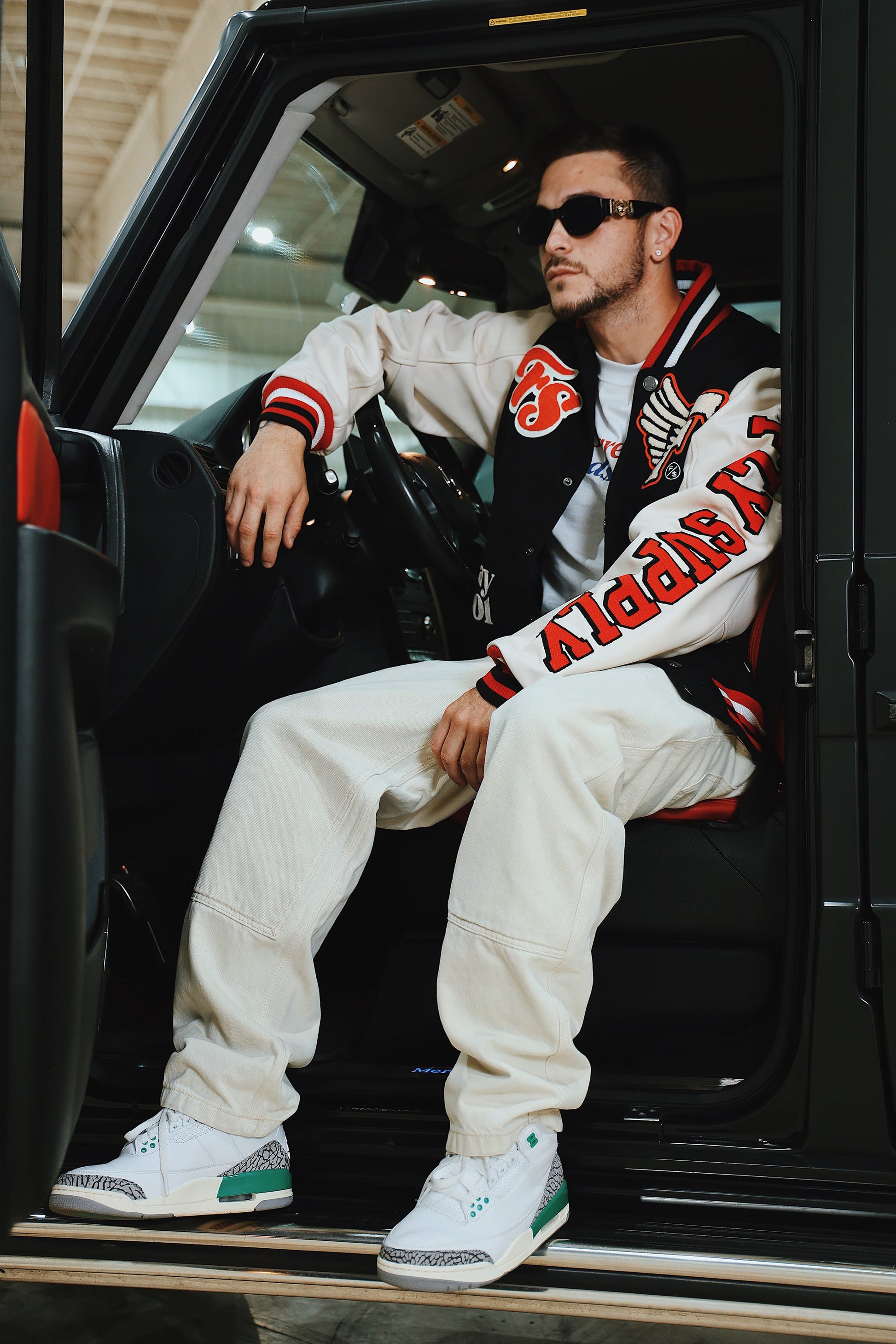 Manifest Varsity Jacket (Black) - RUN THE STREETS COLLABORATIVE