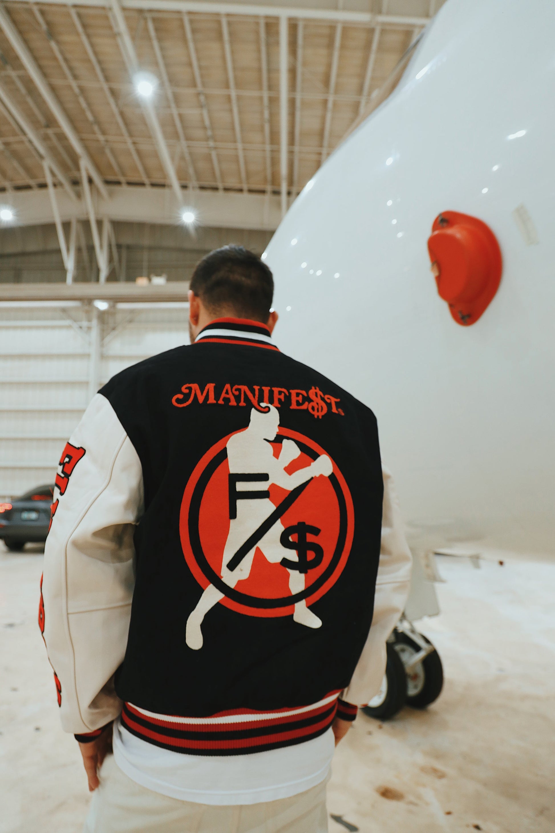 Manifest Varsity Jacket (Black) - RUN THE STREETS COLLABORATIVE