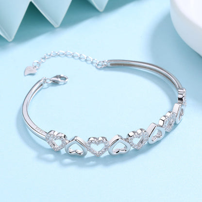 14K White Gold Hearts Bangle Adjustable Bracelet with crystals from Swarovski - RUN THE STREETS COLLABORATIVE