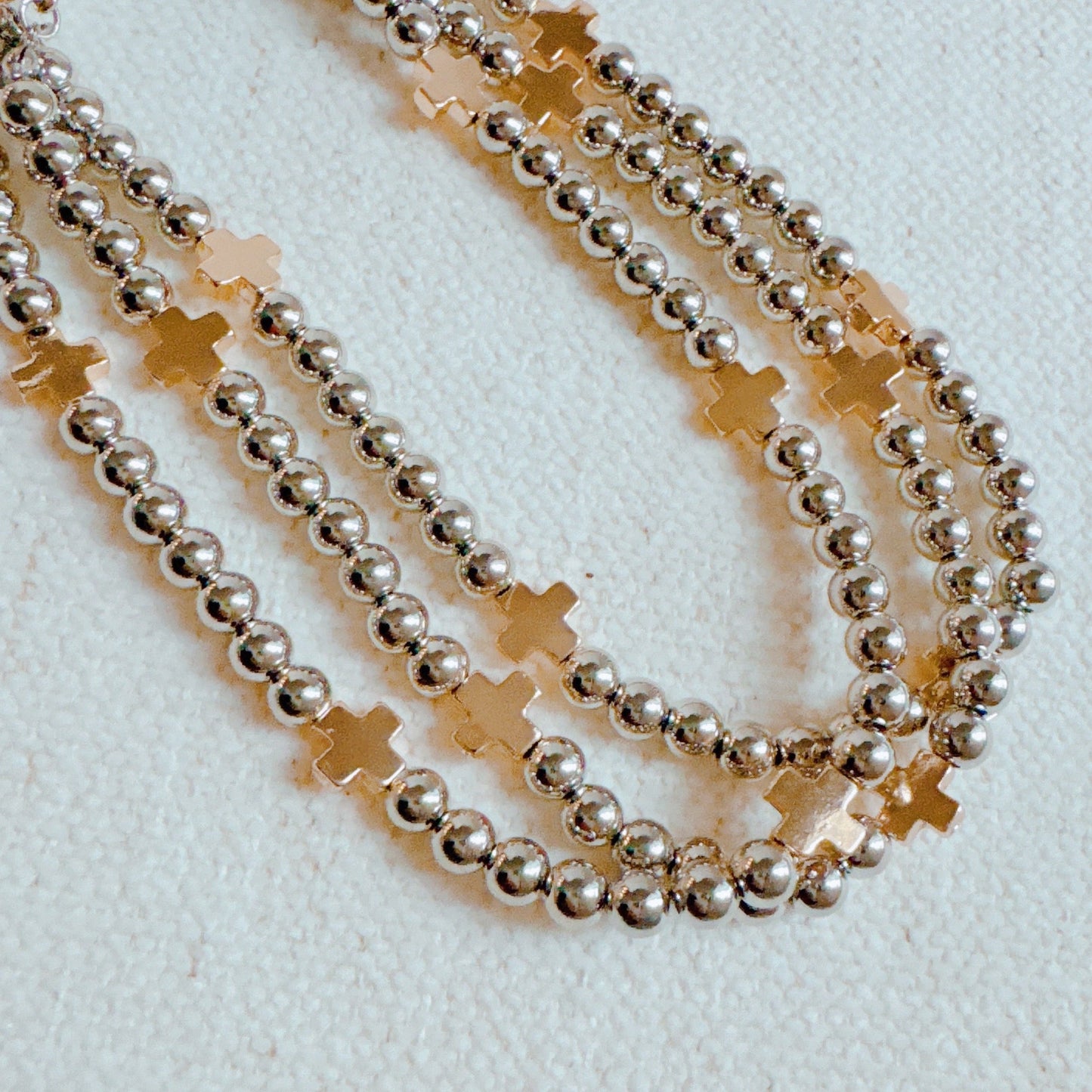 Triple Layers Of Blessings Cross Necklace - RUN THE STREETS COLLABORATIVE