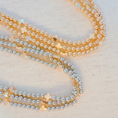 Triple Layers Of Blessings Cross Necklace - RUN THE STREETS COLLABORATIVE