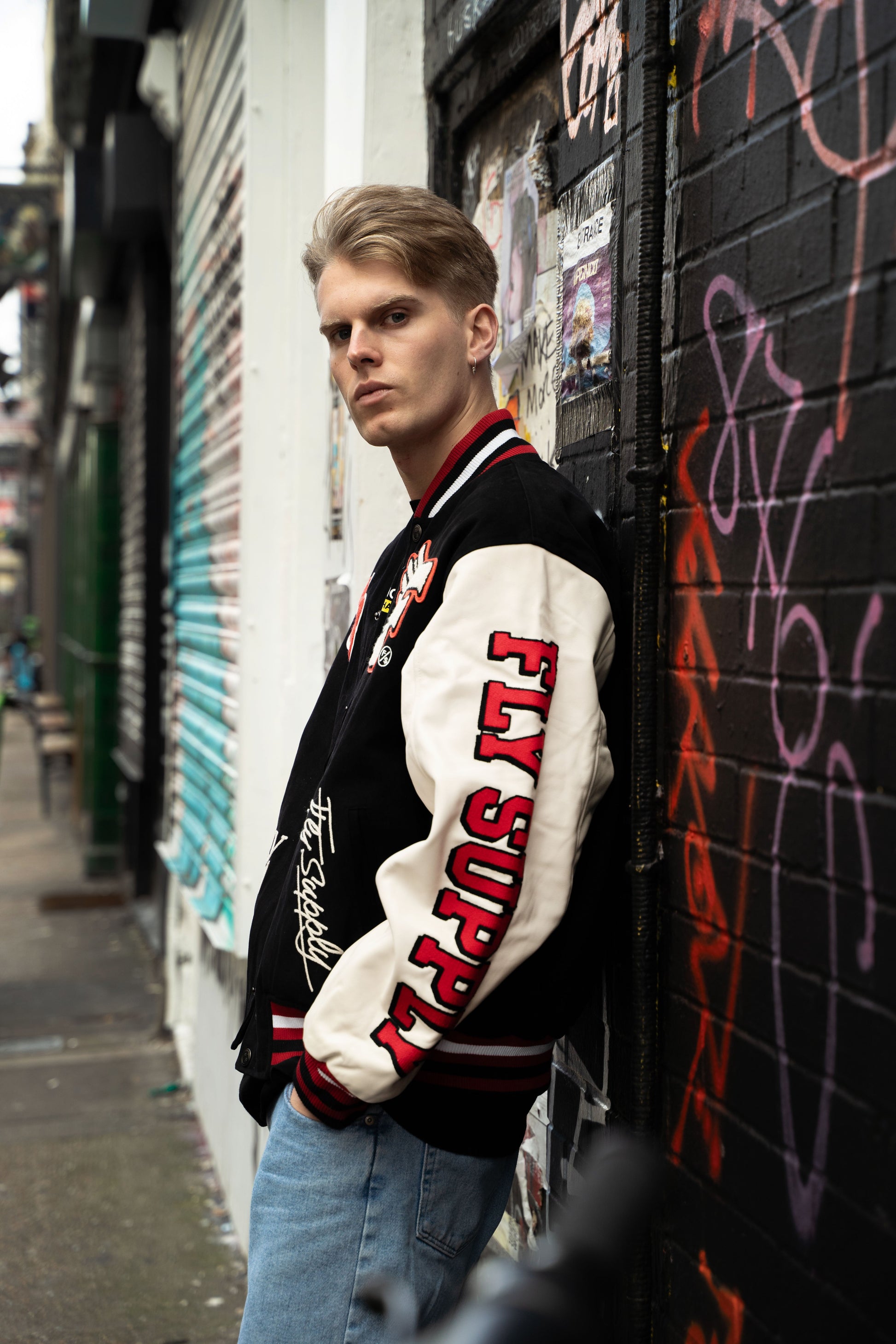 Manifest Varsity Jacket (Black) - RUN THE STREETS COLLABORATIVE