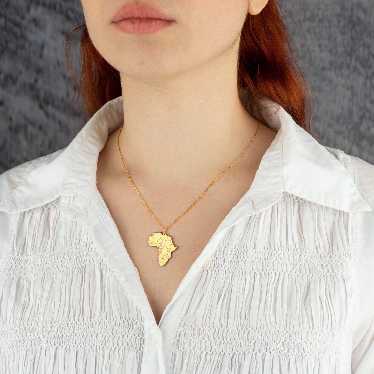 Africa Map Necklace - RUN THE STREETS COLLABORATIVE