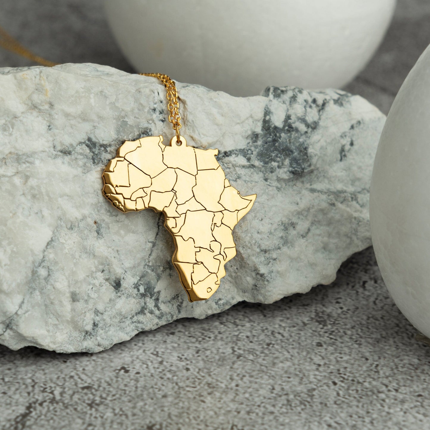 Africa Map Necklace - RUN THE STREETS COLLABORATIVE